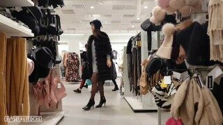 Hot babe shows her pussy and ass in the store