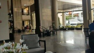 She masturbates right in the hotel lobby